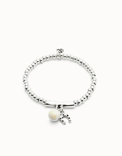 Beaded stretch bracelet with a murano glass and a horseshoe charm