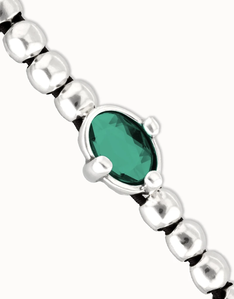 Beaded bracelet with oval faceted green crystal