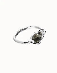 Bangle bracelet with oval faceted gray crystal