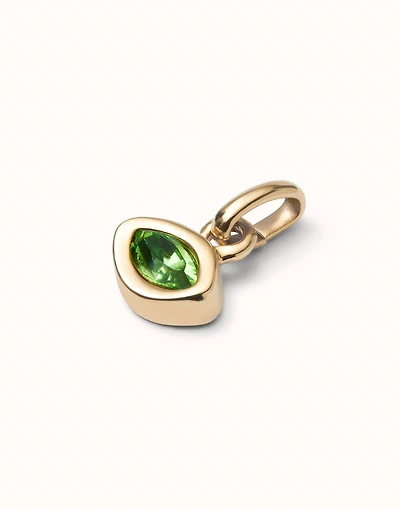 Charm with green crystal