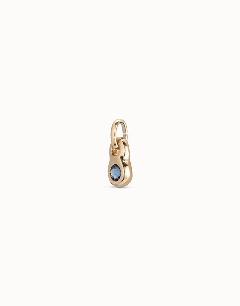 Round shaped Charm with a blue crystal
