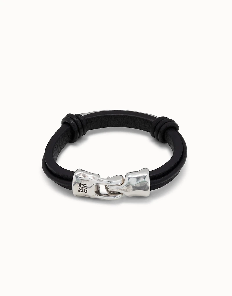 Leather bracelet with a tube in the center