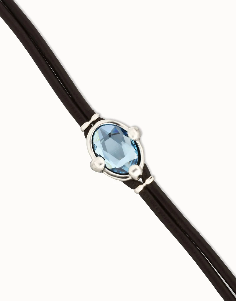 Leather bracelet with blue oval faceted crystal