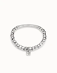 Beaded stretch bracelet with tubular piece