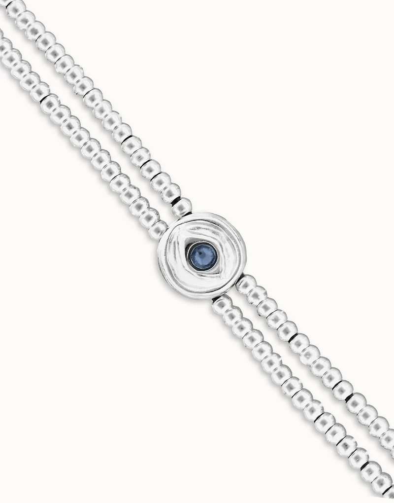 Two-strand beaded bracelet with an eye-shaped charm