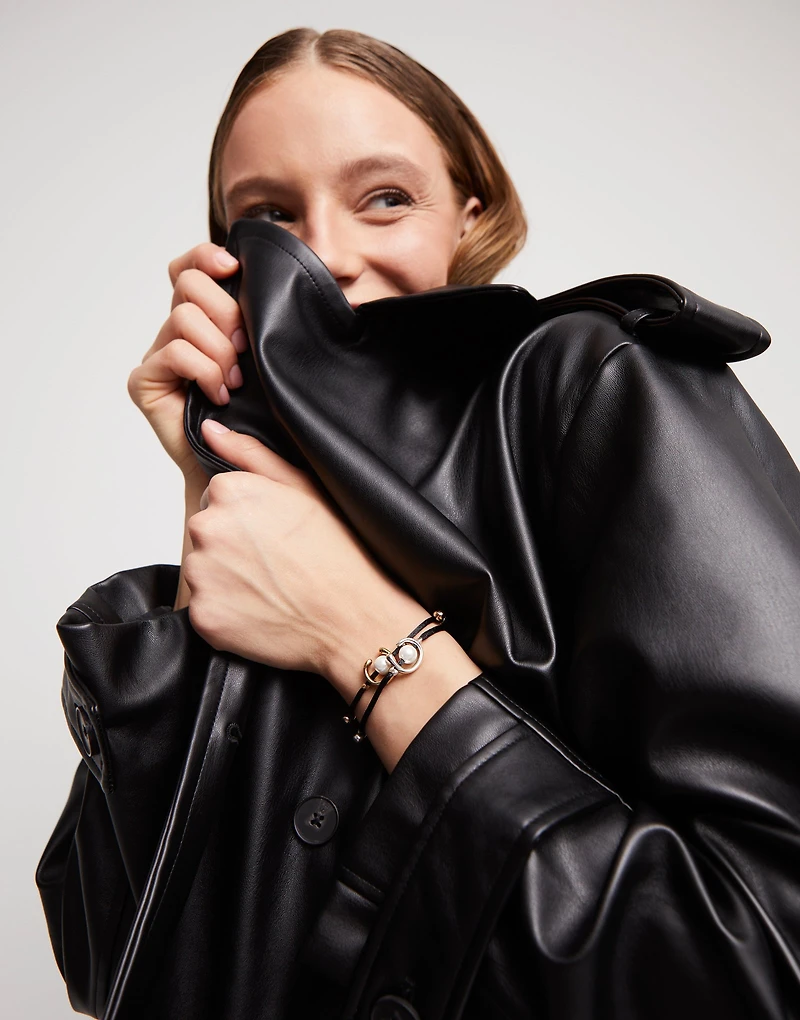 Black cord bracelet with a pearl