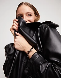 Black cord bracelet with a pearl