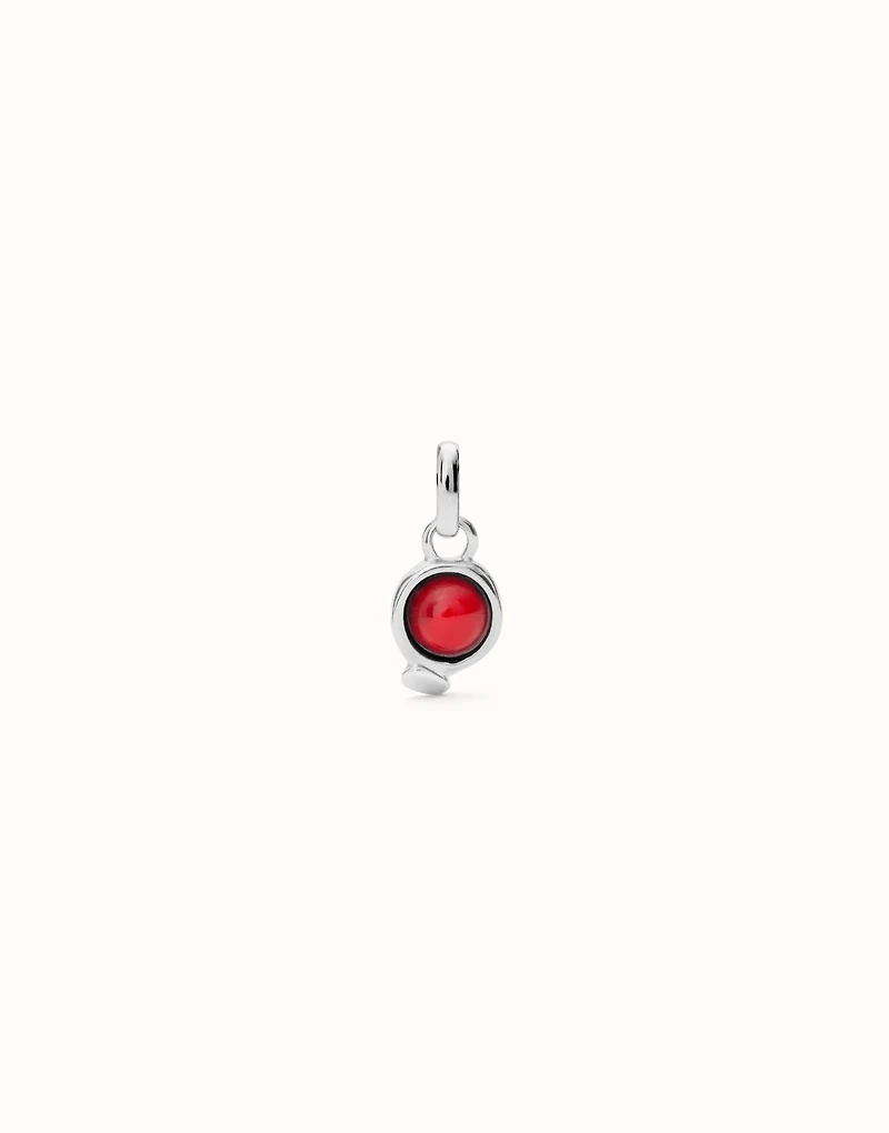 Charm with red stone