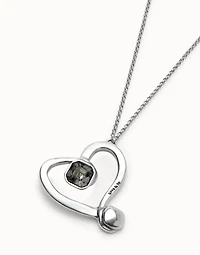 Long chain pendant necklace with a large heart