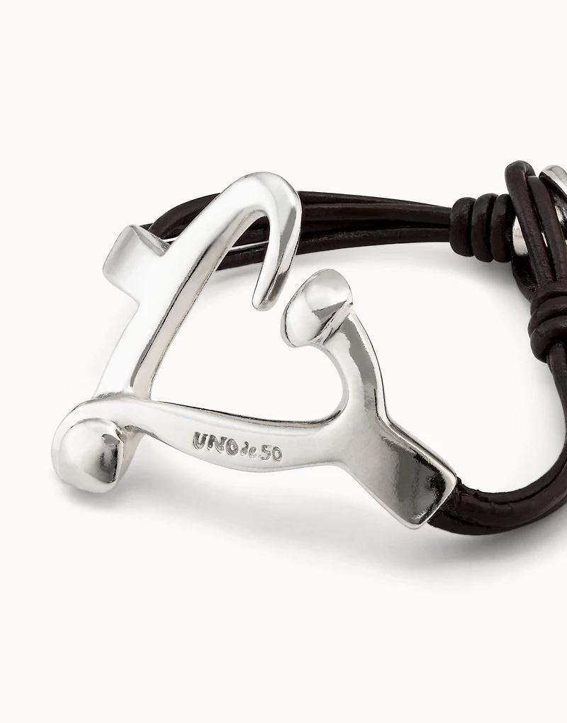 Leather bracelet with a nailed heart shape