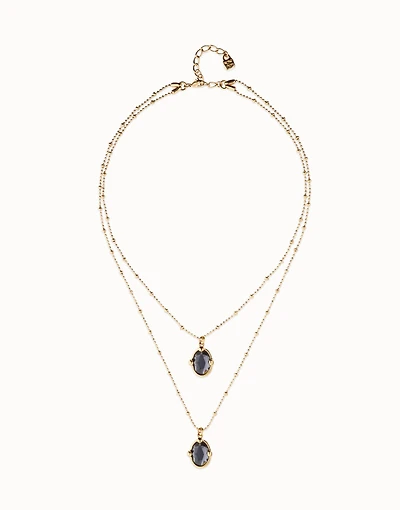 Multi strand necklace with two black oval faceted crystals