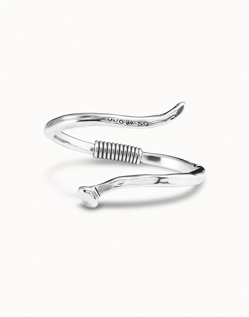 Bangle bracelet with a spiral-shaped nail