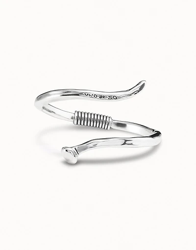 Bangle bracelet with a spiral-shaped nail