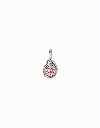 Charm with a pink crystal
