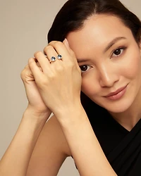 Ring with two pink crystals