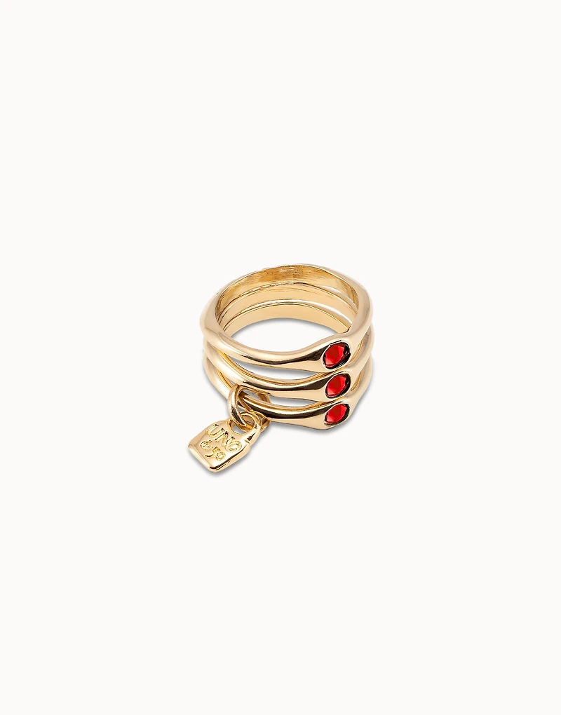 Triple ring with red crystals