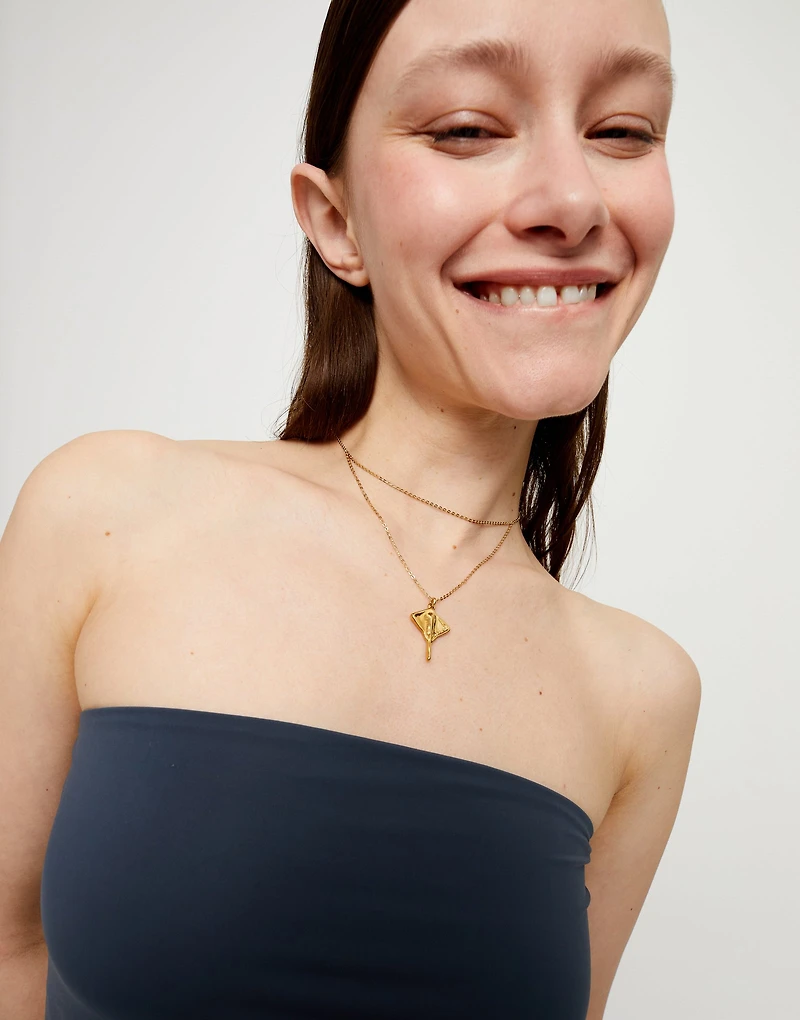 Multi strand chain necklace with manta ray