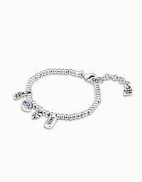 Beaded stretch bracelet with charms