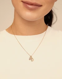 Round shaped Charm with a blue crystal