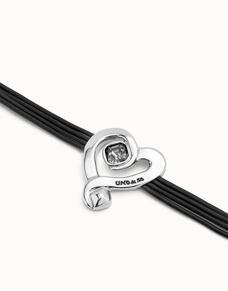 Multi strand leather bracelet with a heart