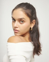 Stud earrings with elongated organic shapes