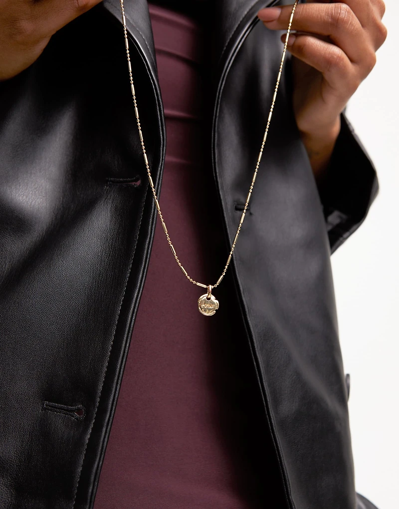 Charm with the word “love