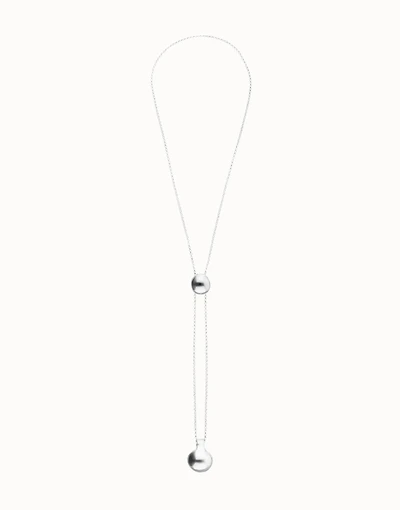Long necklace with an adjustable chain and two weights