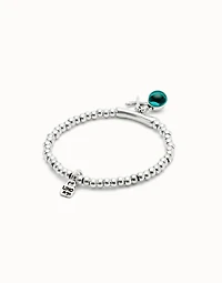 Beaded stretch bracelet with a murano glass and a dragonly