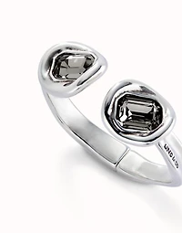 Bangle bracelet with two grey crystals