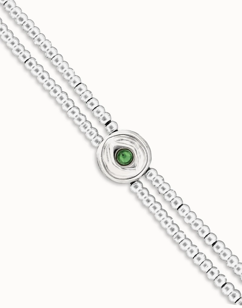 Two-strand beaded bracelet with an eye-shaped charm