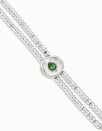 Two-strand beaded bracelet with an eye-shaped charm