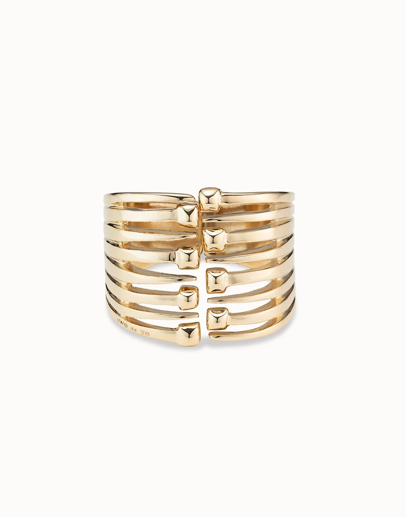 Bangle bracelet with multiple nail heads