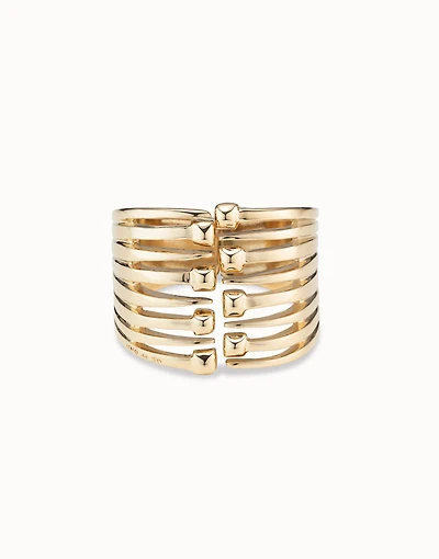 Bangle bracelet with multiple nail heads