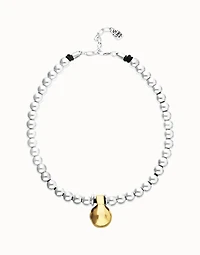 Beaded necklace with medium spheres and a large sphere