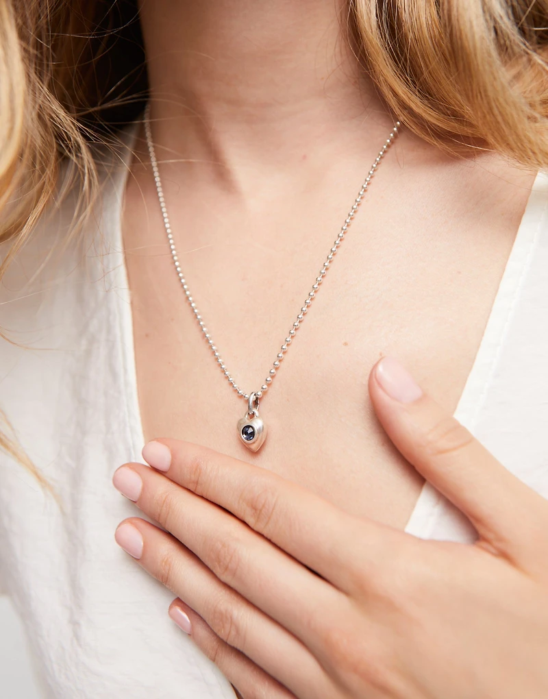 Charm with blue crystal