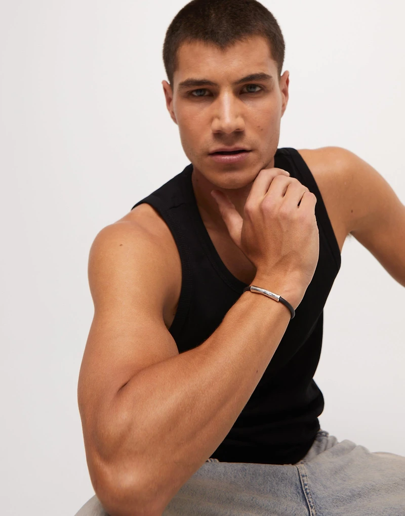 Brown leather bracelet with sterling silver-plated central detail