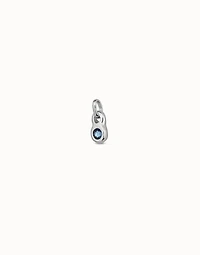 Round shaped Charm with a blue crystal
