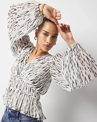 Ikat Pleated Peplum Blouse