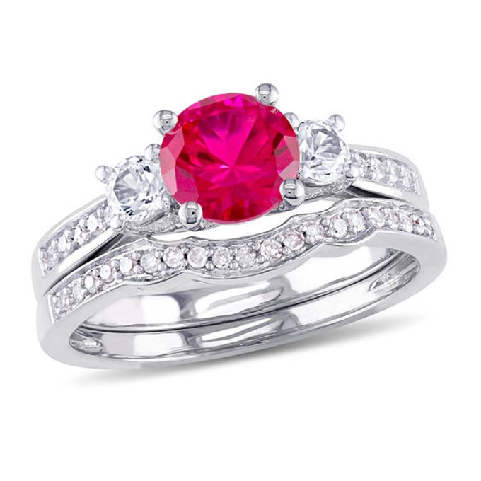 6.0mm Lab-Created Ruby and White Sapphire with 1/8 CT. T.w. Diamond Three Stone Bridal Set in 10K White Gold