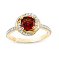 6.0mm Garnet and 1/6 CT. T.w. Diamond Orbit Frame Ring in 10K Gold