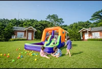 CocoNut Castles Jumpy Bouncy Castle with Slide and Splash Pad                                                                   