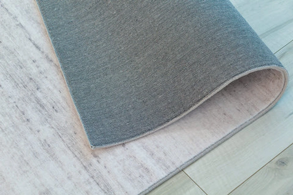 Europa Beige Solid Textured Area Rug