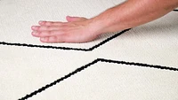 Ivory Leela Minimalist Brushstroke Area Rug