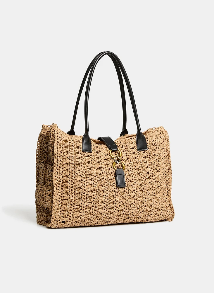 Sac à main en paille à détail métallique