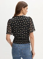 Blouse cache-coeur à motif floral