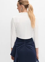 Boléro à épaules bouffantes