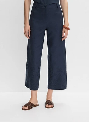 Pantalon large à ourlet brodé