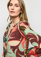 Blouse à manches bouffantes et motif géométrique