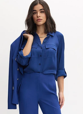 Blouse en satin à poches utilitaires