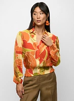 Blouse à motif géométrique et manches ballon